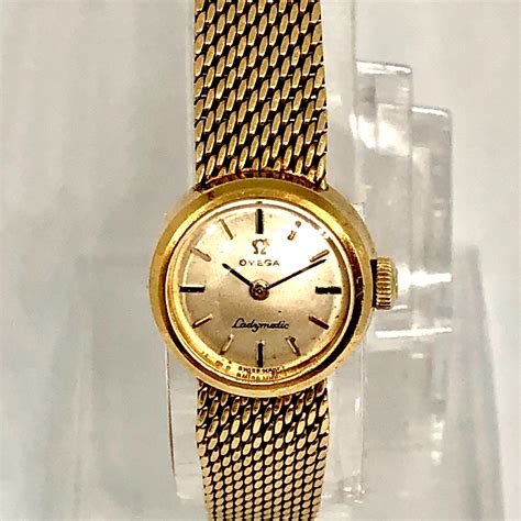 omega 18 carat gold watch.